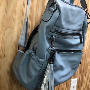 Backpack purse. 2 zip pockets in front.